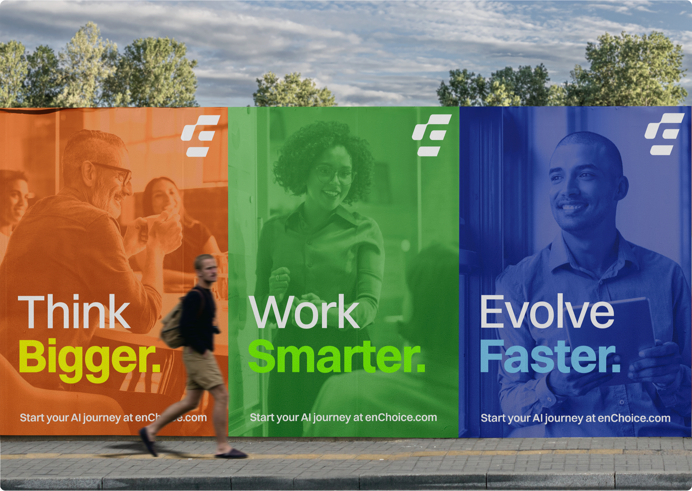 Street billboards reading “Think Bigger.”, “Work Smarter.”, “Evolve Faster.” in orange, green and blue